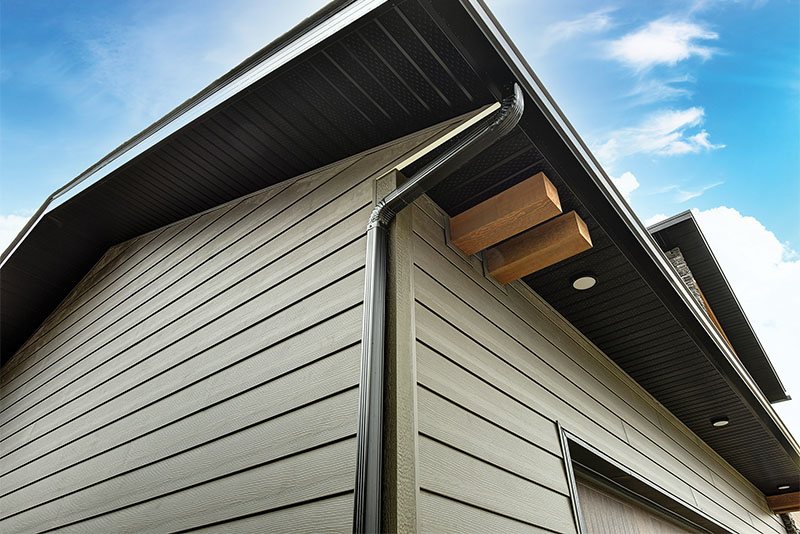 Dark soffit with exposed wood accents beneath a gabled roof